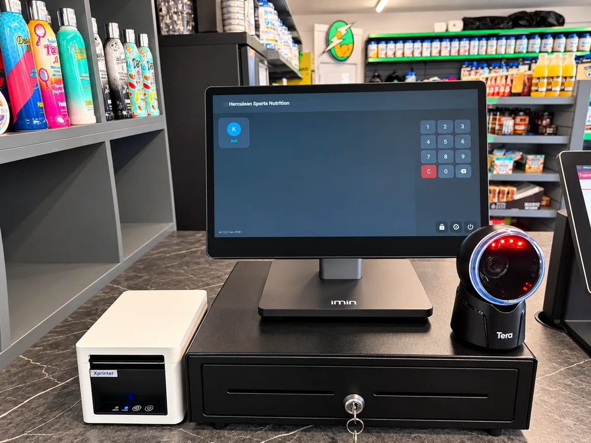 EPOS till installed on a shop counter with receipt printer, cash drawer and barcode scanner