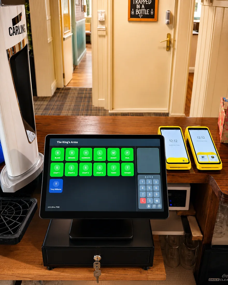 EPOS till behind a pub bar with two card machines beside it